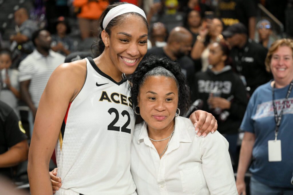 WNBA star A'ja Wilson poses for a photo with her college head coach, Dawn Staley.
