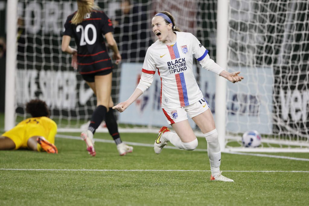 Rose Lavelle #16 of the OL Reign celebrates after scoring a goal during the second half against the Portland Thorns at Providence Park on April 02, 2022 in Portland, Oregon. 
