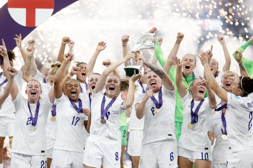 Women's World Cup hosts England celebrate with the UEFA Women’s EURO 2022 Trophy after their side's victory during the UEFA Women's Euro 2022 final match  between England and Germany at Wembley Stadium.