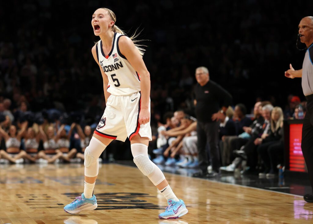 UConn star Paige Bueckers screams on the NCAA basketball court ahead of the 2025 Final Four.