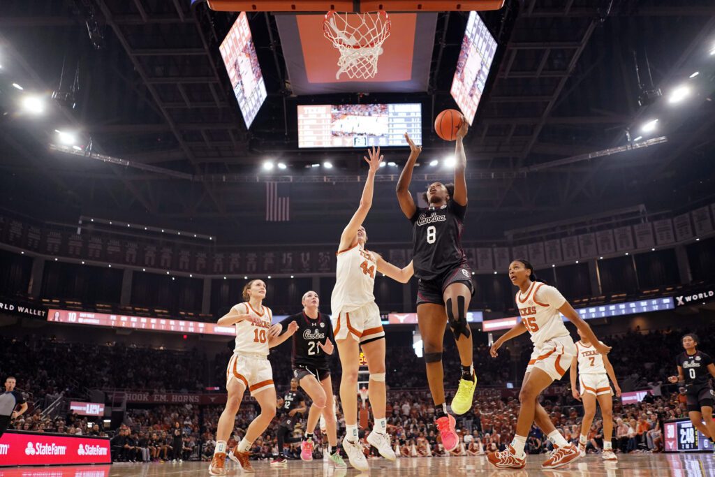 Final Four team South Carolina Gamecocks forward Joyce Edwards (8) drives to the basket past Texas Longhorns forward Taylor Jones (44) during the first half at Moody Center.