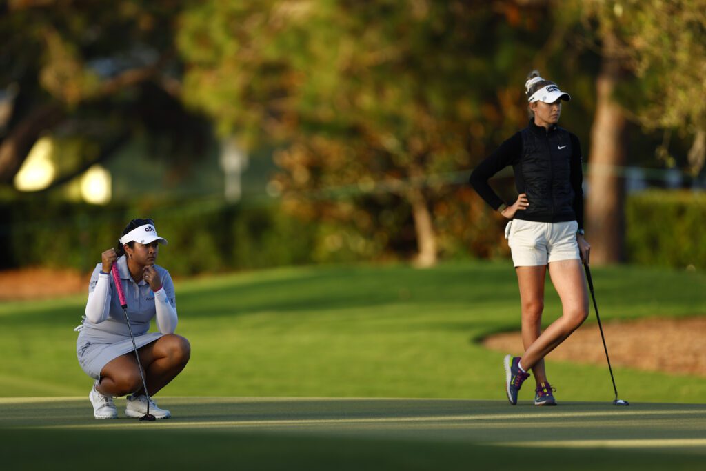 US golf stars Lilia Vu and Nelly Korda  eye the green during a 2024 LPGA tournament.
