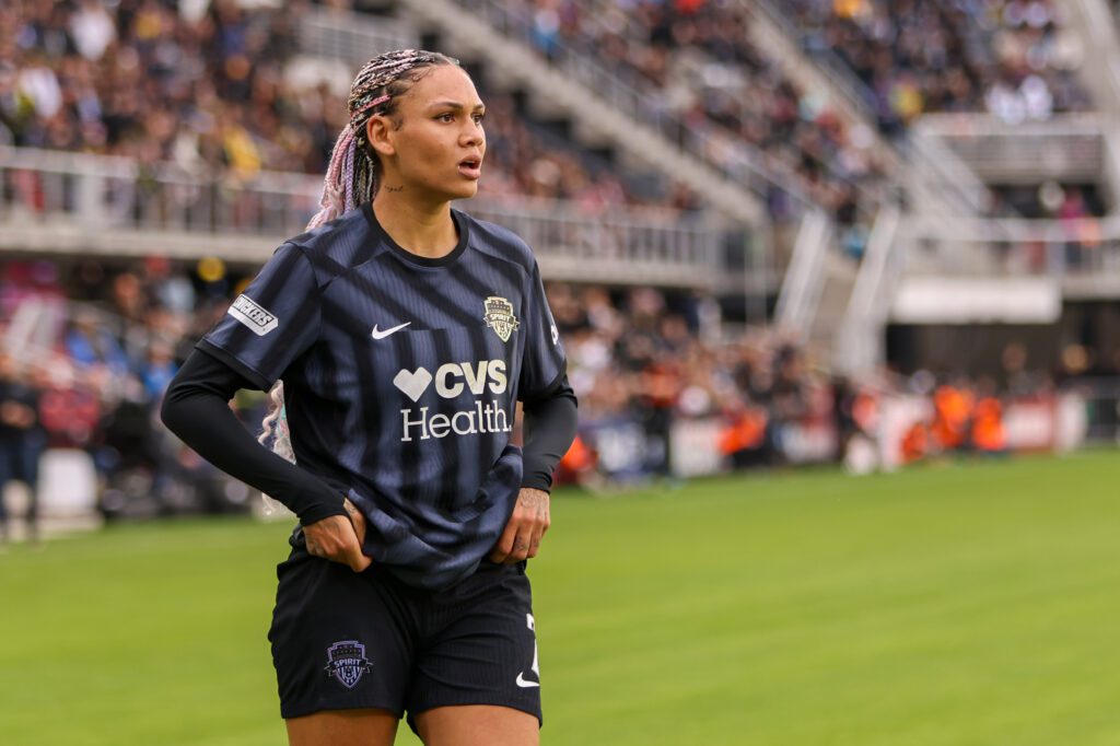 Washington Spirit star Trinity Rodman looks across the pitch during a 2024 NWSL Playoff game.