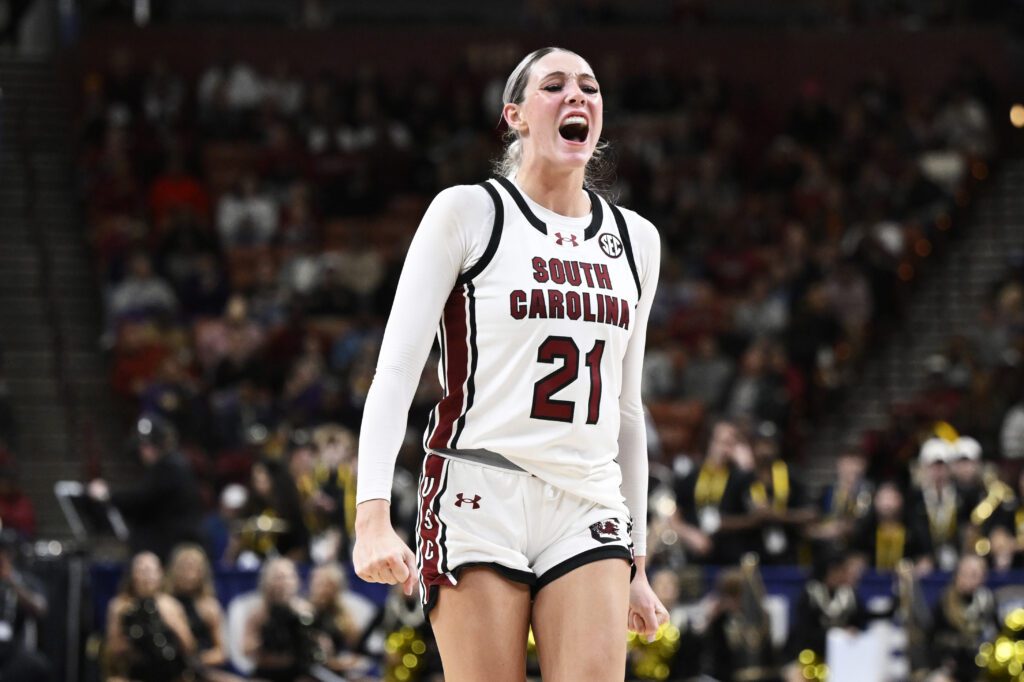 March Madness star Chloe Kitts #21 of the South Carolina Gamecocks celebrates a basket against the Vanderbilt Commodores in the fourth quarter during the quarterfinal round of the SEC women's basketball tournament at Bon Secours Wellness Arena on March 07, 2025 in Greenville, South Carolina. 