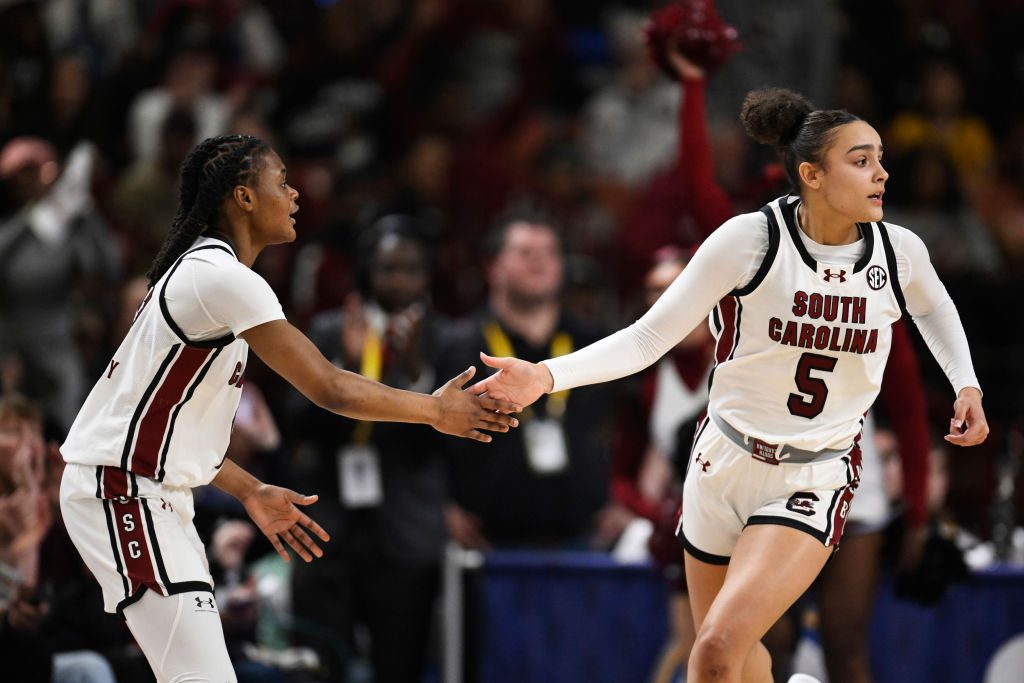 Sweet 16 bound Tessa Johnson #5 of the South Carolina Gamecocks and MiLaysia Fulwiley #12 celebrate against the Texas Longhorns in the third quarter during the championship of the SEC women's basketball tournament at Bon Secours Wellness Arena on March 09, 2025 in Greenville, South Carolina.
