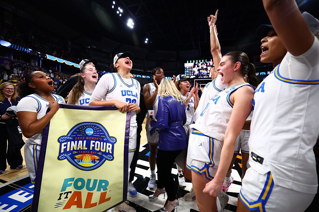 UCLA Bruins players celebrate postgame after beating the LSU Lady Tigers 72-65 during the Elite Eight round of the 2025 NCAA Women's Basketball Tournament