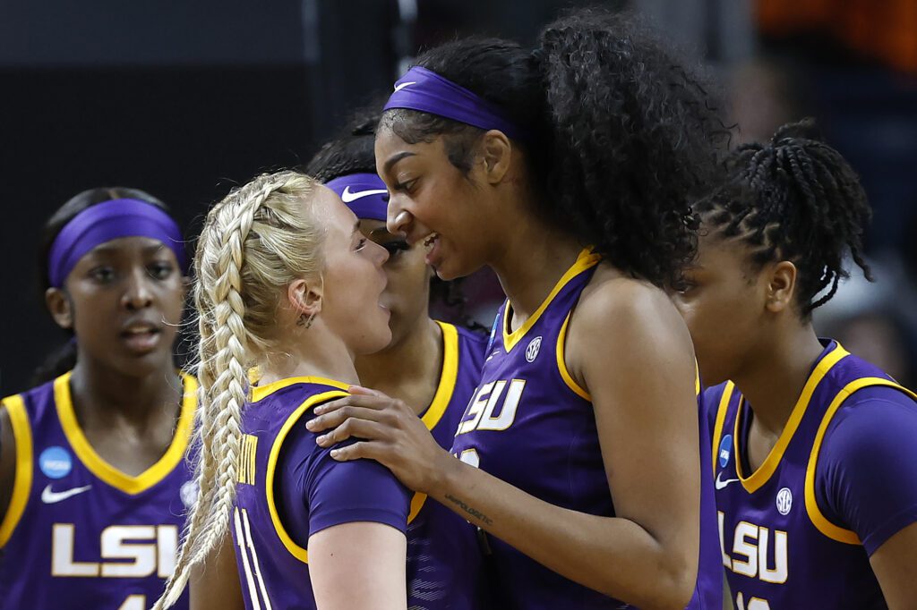 LSU teammates Hailey Van Lith and Angel Reese celebrate a play during a 2024 NCAA tournament game.