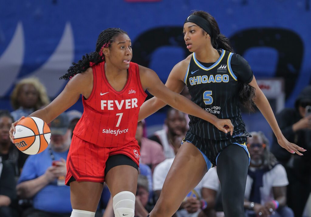 Chicago's Angel Reese defends Indiana's Aliyah Boston during a 2024 WNBA game.