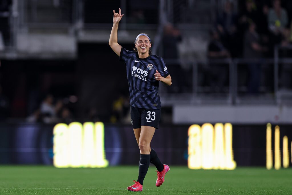 Washington Spirit striker Ashley Hatch celebrates a goal during a 2025 NWSL match.