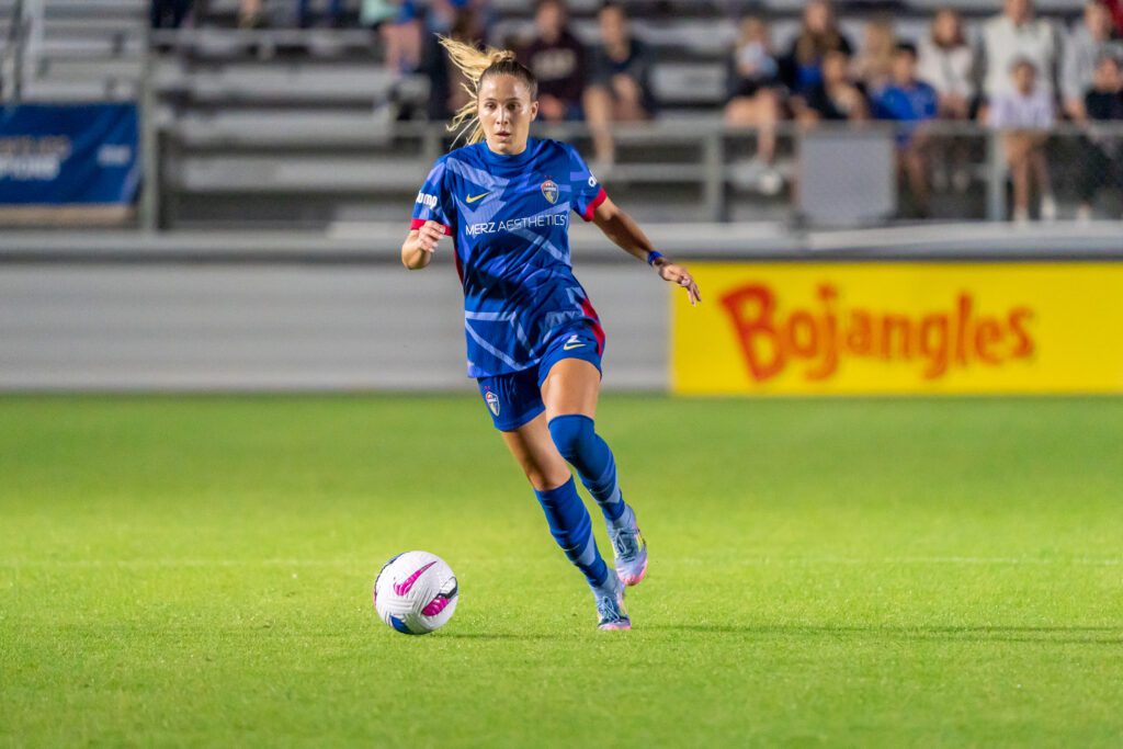 Ashley Sanchez dribbles the ball during the NC Courage's win over the KC Current on Saturday.
