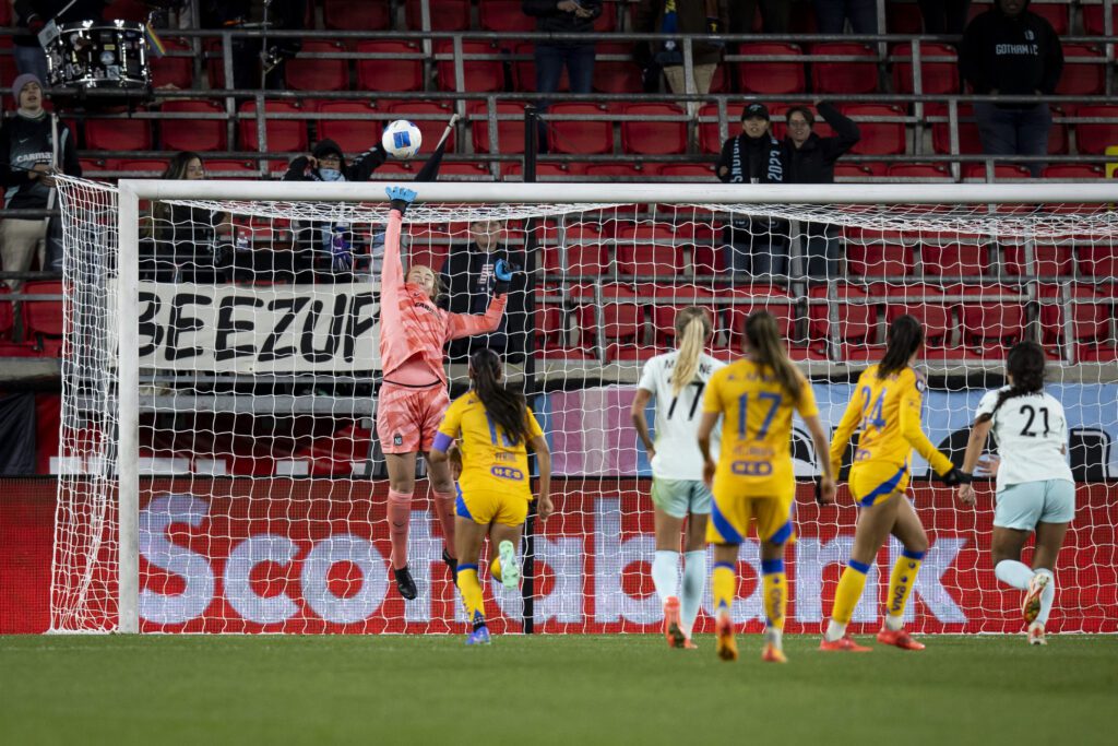 Gotham goalie Cassie Miller makes a save during a 2024 Concacaf W Champions Cup group-stage match.