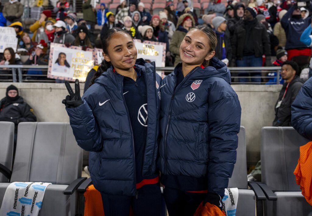 Alyssa Thompson #7 and Gisele Thompson #15 of the United States pose for a photo before a SheBelieves Cup match between Colombia and USWNT at Shell Energy Stadium on February 20, 2025 in Houston, Texas. 