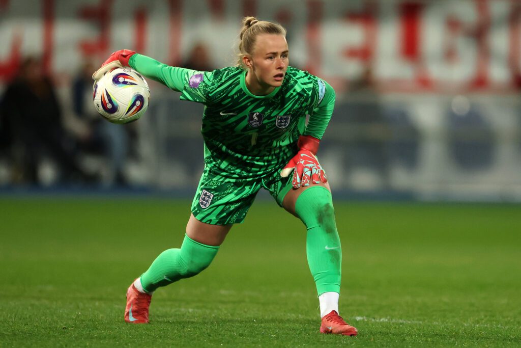 England goalkeeper Hannah Hampton passes the ball during a 2025 UEFA Nations League match.