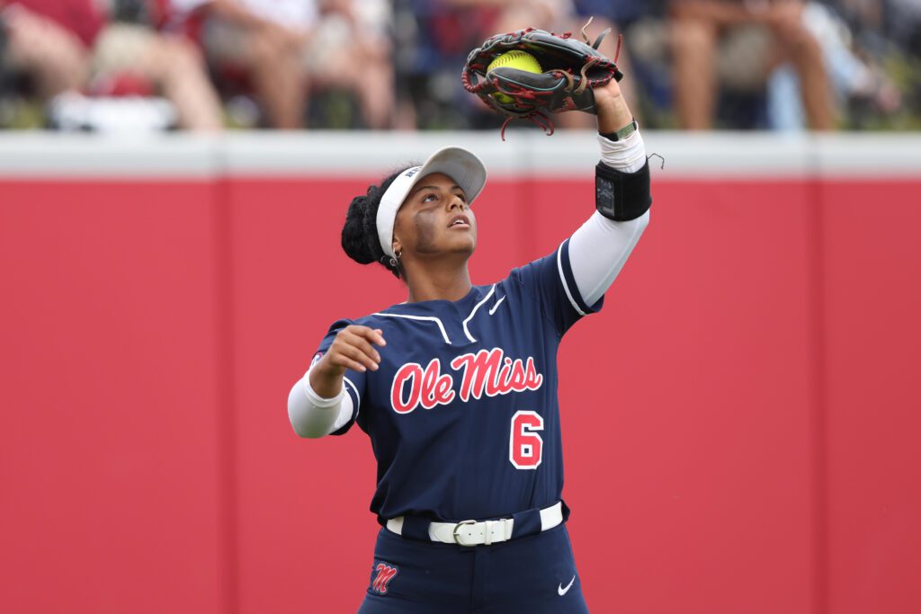 Ole Miss left fielder Jaden Pone catches a fly ball during a 2024/25 NCAA softball tournament Super Regional game.
