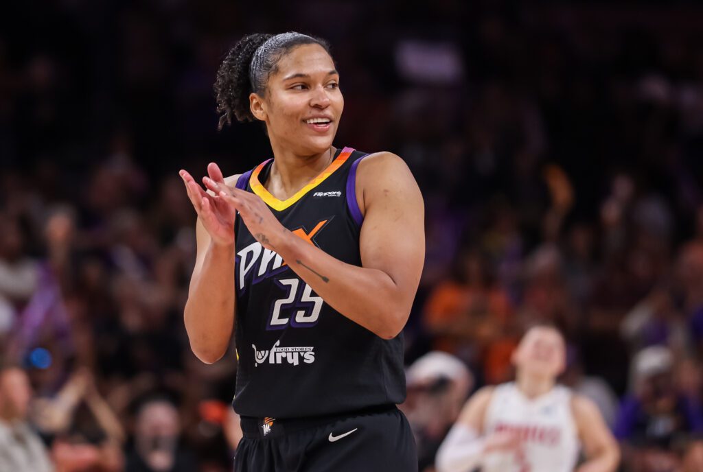 Phoenix Mercury forward Alyssa Thomas celebrates a play during a 2025 WNBA game.