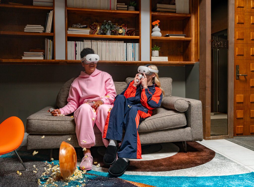 Instagram podcast Close Friends Only stars Azzi Fudd and Paige Bueckers sit on a couch wearing MetaQuest VR headsets.