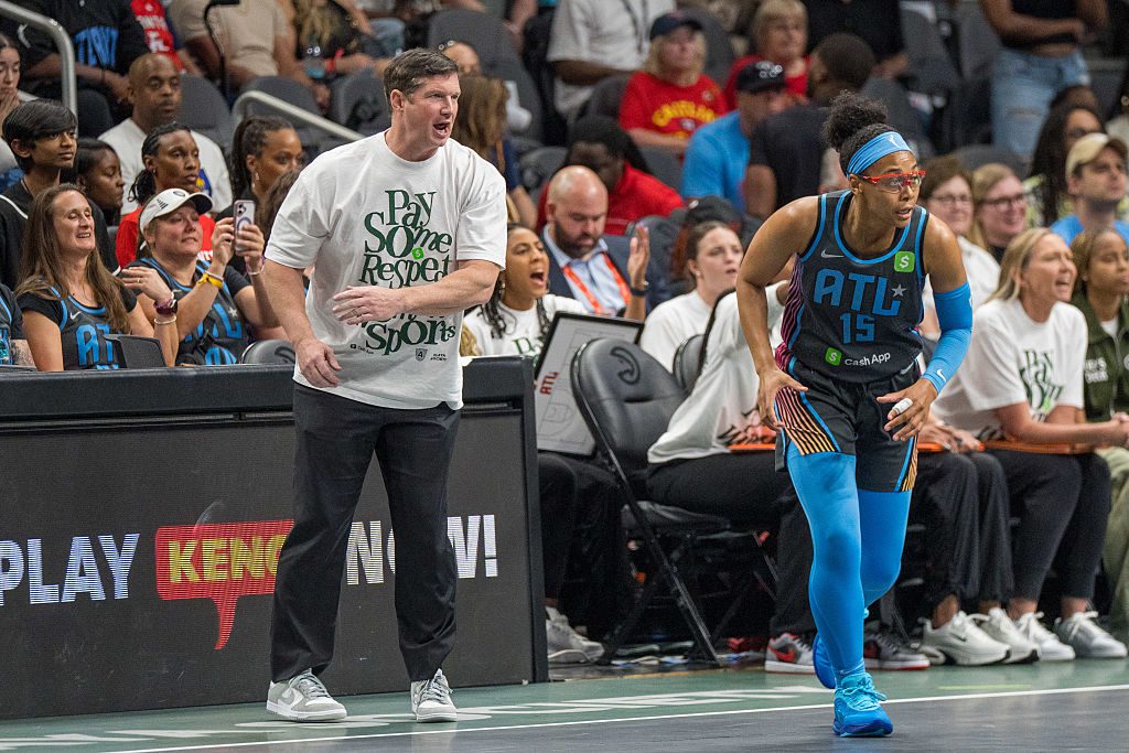 Head coach Karl Smesko yells a play to Allisha Gray #15 of the Atlanta Dream during the first quarter of a game between the Indiana Fever and Atlanta Dream at State Farm Arena on May 22, 2025 in Atlanta, Georgia. 