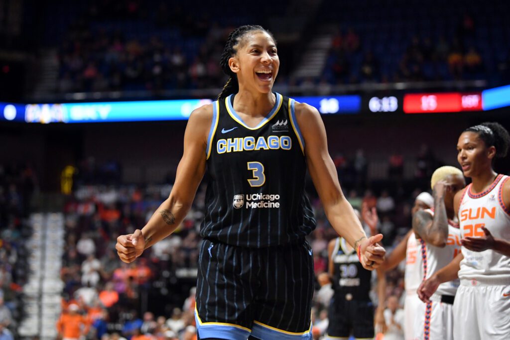 Chicago Sky star Candace Parker smiles during a 2022 WNBA semifinals game.