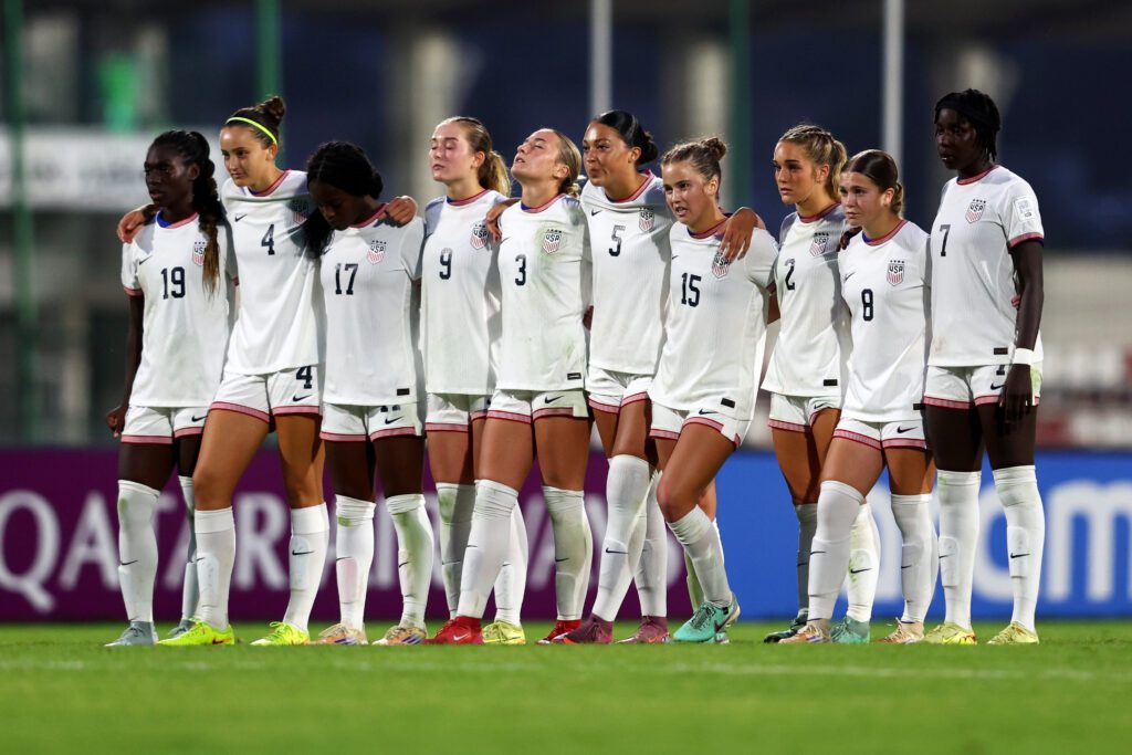 USWNT U-17 players watch during a penalty shootout at the 2025 FIFA U-17 World Cup.