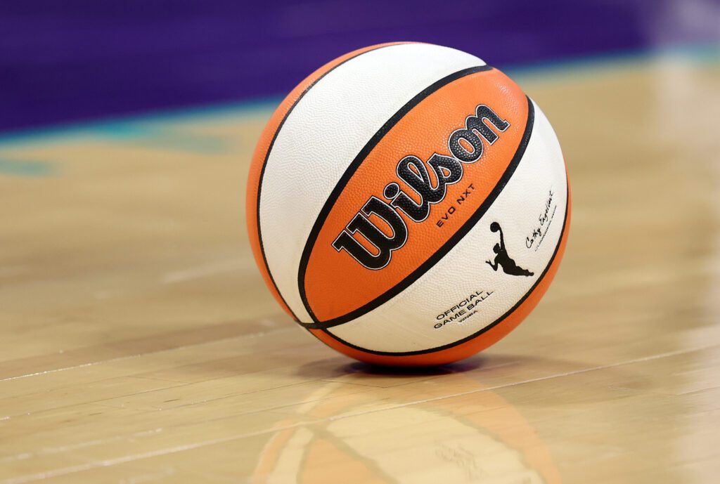 A WNBA basketball rests on the court during a 2025 game.