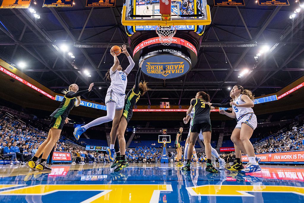 Center Lauren Betts #51 of the UCLA Bruins lays the ball up during the second half of a game against the Oregon Ducks at Pauley Pavilion on December 7, 2025 in Los Angeles, California.