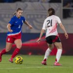 USWNT attacker Ally Sentnor dribbles the ball during the 2025 SheBelieves Cup final against Japan.
