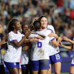 USWNT attacker Emma Sears hugs goalscorer Emily Sams during a 2026 friendly against Chile.