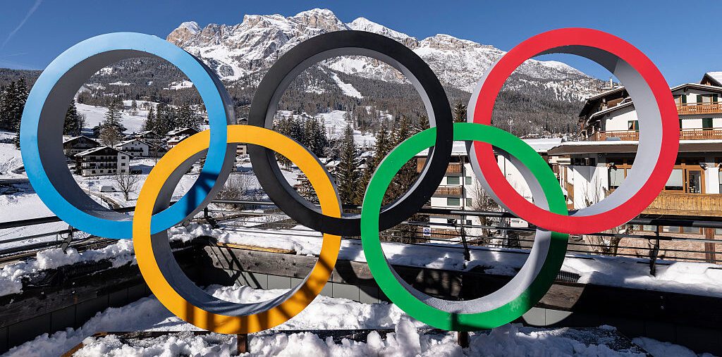 The Winter Olympics Opening Ceremony Rings are set in front of surrounding mountains on January 27, 2026 in Cortina d'Ampezzo, Italy. Cortina will host Sliding, Curling and Women's Alpine events.