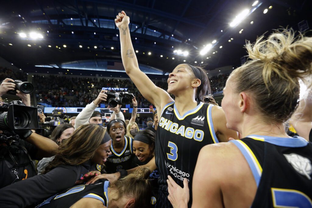 Candace Parker celebrates with her Chicago Sky teammates after winning the 2021 WNBA Championship.