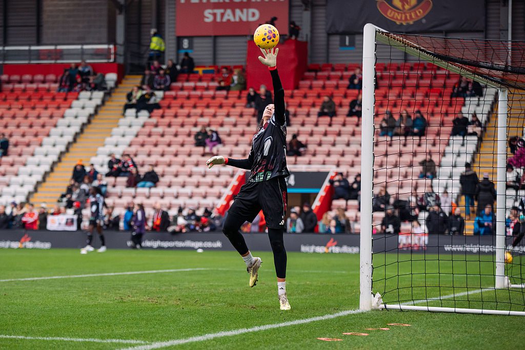 Phallon Tullis-Joyce of Manchester United warms up during the Barclays Women's Super League match between Manchester United and Liverpool at Progress with Unity Stadium on February 01, 2026 in Leigh, England.