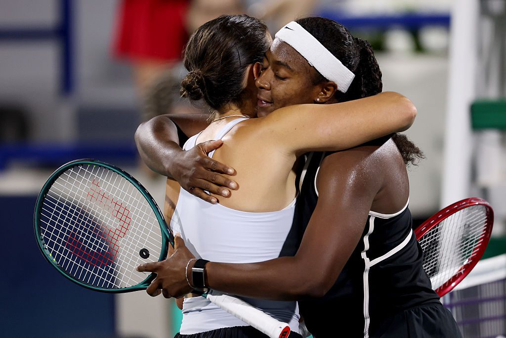 Hailey Baptiste of the United States Emma Navarro of the United States, embrace at the net after the second round match during day three of the Mubadala Abu Dhabi Open, part of the Hologic WTA Tour, at Zayed Sports City on February 03, 2026 in Abu Dhabi, United Arab Emirates.