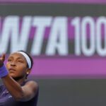 Coco Gauff of the United States serves Elisabetta Cocciaretto of Italy against during the Qatar TotalEnergies Open, part of the Hologic WTA Tour at Khalifa International Tennis and Squash Complex on February 10, 2026 in Doha, Qatar.